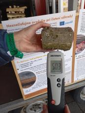 Moisture meter in use